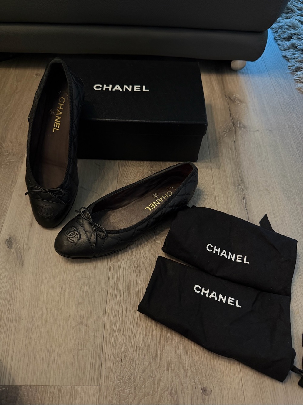 CHANEL Black Quilted Leather Ballet Flats with CC Toe